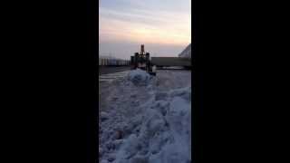 Snow Stacking New Holland Backhoe WB110 January 8, 2013 Part 1