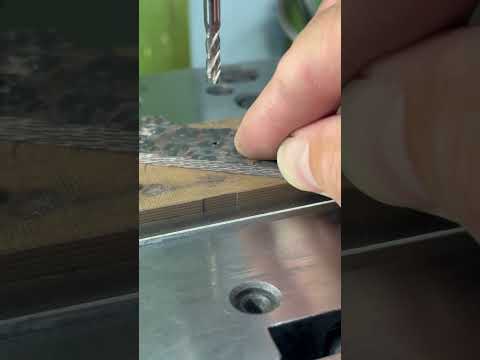 Boring a hole in handle material