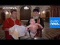 This baptism in georgia is enough to make your head spin  orthodox religion