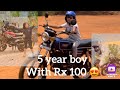 A boy with yamaha rx 100  yamaharx100