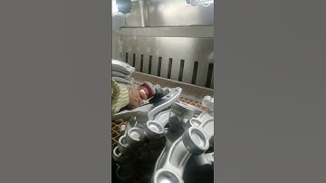 Dust removal machine for polishing table of new energy die-casting parts