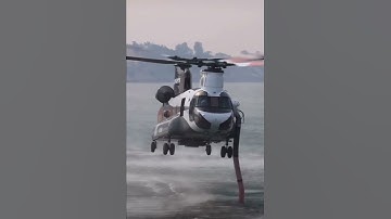 Heavy helicopter sucking up a load.