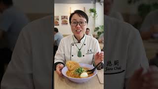 Chef Jane Chai Savoring a Bowl of Hearty Prawn Mee