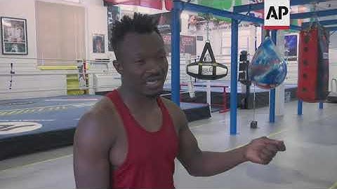Cameroon boxer, 9 years after deserting Olympics