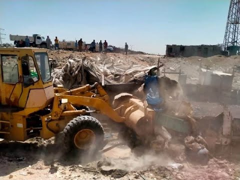 جهاز 15 مايو يكشر عن أنيابه بإزالة تعديات على مساحة 2 فدان من أراضى الدولة