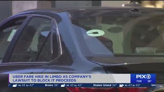 NYC judge temporarily blocks ride-hailing driver's pay raise