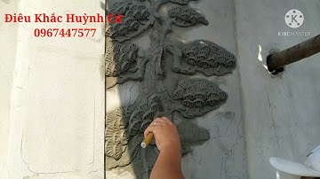 Điêu khắc bức tranh tùng hạc bằng xi măng . nghệ thuật điêu khắc