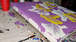 Orange And White Bead Pull On Purple Base.