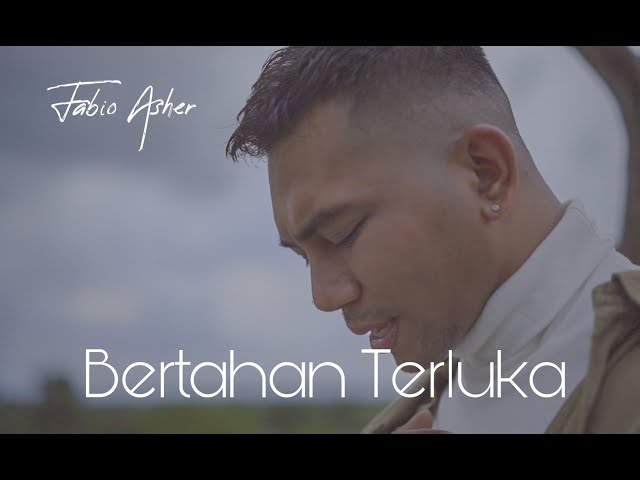 FABIO ASHER - BERTAHAN TERLUKA (OFFICIAL MUSIC VIDEO) class=