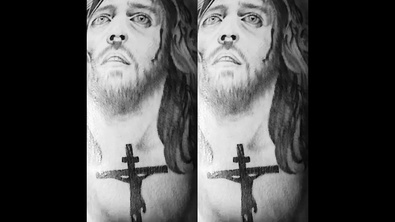 4. Jesus Portrait Arm Tattoo - wide 8