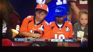 Young Broncos fan LIKES what he SEES