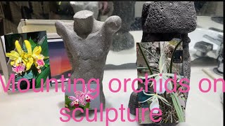 картинка: Установка гибридной орхидеи Каттлея на статую #скульптура #установленныеорхидеи