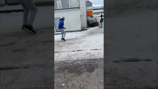 Youngman Slips on Ice