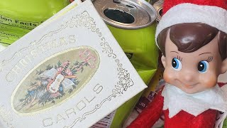 ELF CAUGHT WITH SINGING CHRISTMAS CANS!