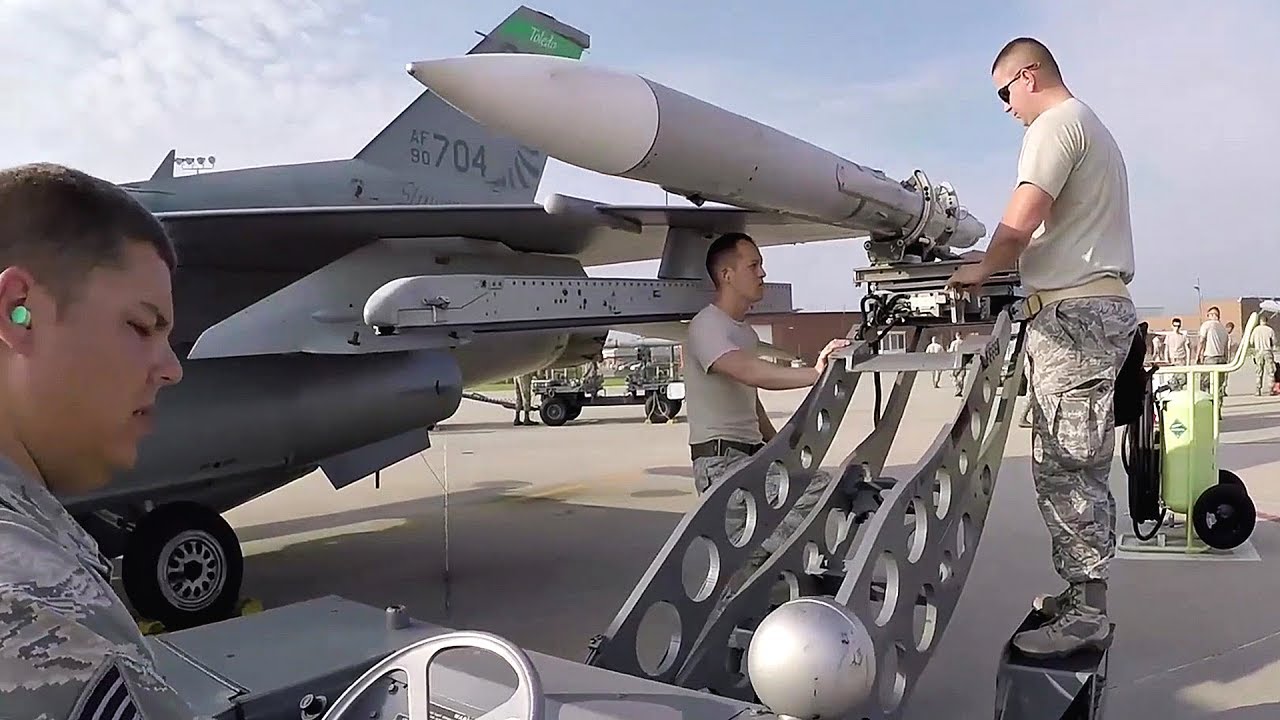 USAF F-16 Pilots And Maintainers Readying Fighter Aircraft For Takeoff