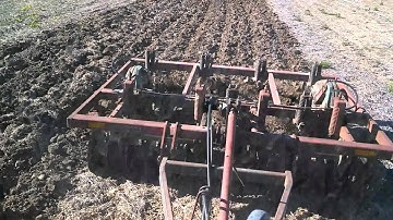 Ford 8240 pulling 7 shank chisel plows