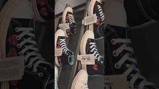 Comme des Garçons Collection. Iconic heart-with-eyes adds a playful twist to the Converse Chuck 70.