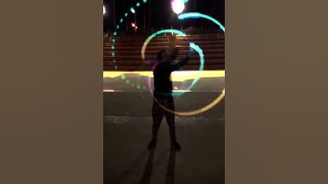 Chris spinning them Pod Poi