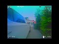 A tiny drone plays in the yard