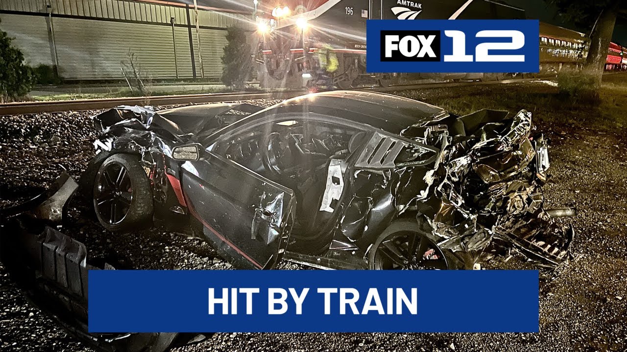 Train hits car on tracks in Milwaukie; no injuries reported - YouTube