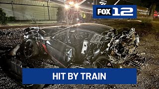 Train hits car on tracks in Milwaukie; no injuries reported