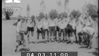 VFL match 4 RAR DPR/TV/680
When Australians erect the goalposts for Aussie Rules football in Terendak Garrison, Malacca, Malaysia, other Commonwealth soldiers look on in disbelief. Aussie Rules may not be the most popular game in the 28th Battalion, but when Royal Australian Regiments B Company Bombers take the field, it is a certain show-stopper. The Bombers were raised at Woodside, South Australia, before 4 RAR was posted to Malaysia. Among the team are many players who ran with big clubs back home. Lance corporal Alan Lewington, of Perth, was a Swan Districts player before entering the Army for his National Service. He recently won the Bombers best and fairest award. Private John Borkowski, of Perth, was also a Swan Districts player before joining the Army. Another team member, Private Blue McKenzie, of Swan Hill, Victoria, played for Geelongs under-19 squad when he was a civilian. The players are mostly all round sportsmen. Lance-Corporal Lewington is the battalion high jump champion and a strong sprinter. Lance-corporal Winston Gregory. of Adelaide, is one of the battalions best cricketers and was recently selected to play in the Malacca State Cricket XI. He also holds the 4 RAR heavyweight boxing title. Many other players like Private Floyd Ronan, of Albury, NSW; Private George Martini, of Werribee, Victoria; Private Peter Lee, the team captain, of Launceston, Tasmania, were top-class footballers before coming to Mayaysia. One of the Bombers staunchest supporters is Warrant Officer Robert Jock Richardson, of Sorrento Victoria. WO2 Richardson ids B Companys CSM. He recently wrote to several VFL clubs requesting Aussie Rules footballs. Essendon VFL club sent twoo balls to the Bombers. The Bombers play inter-company matches within the battalion and have also played exhibition matches against Australias 110th Light Anti-Aircraft Battery, based at Butterworth in Malaysia. VFL match 4 RAR DPR/TV/680