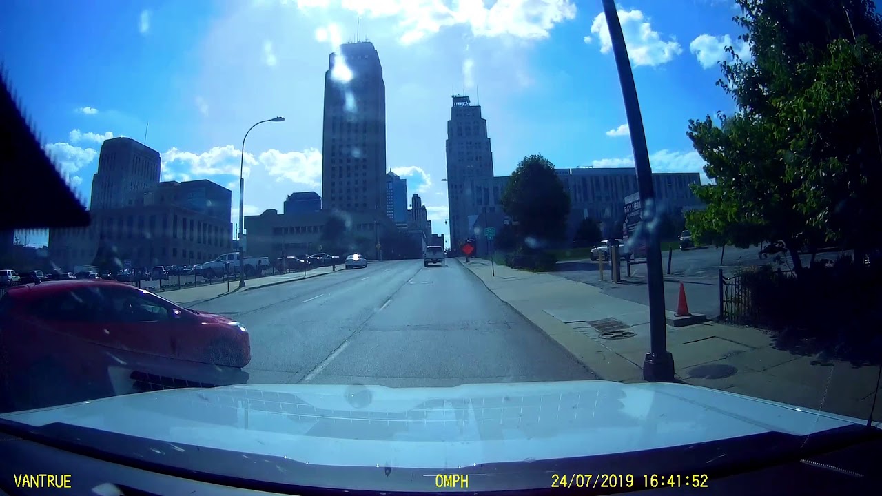 Wide left turn cuts driver off and almost causes accident.