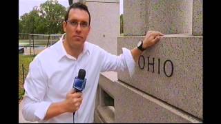 Honor Flight veterans pass through monument barricades