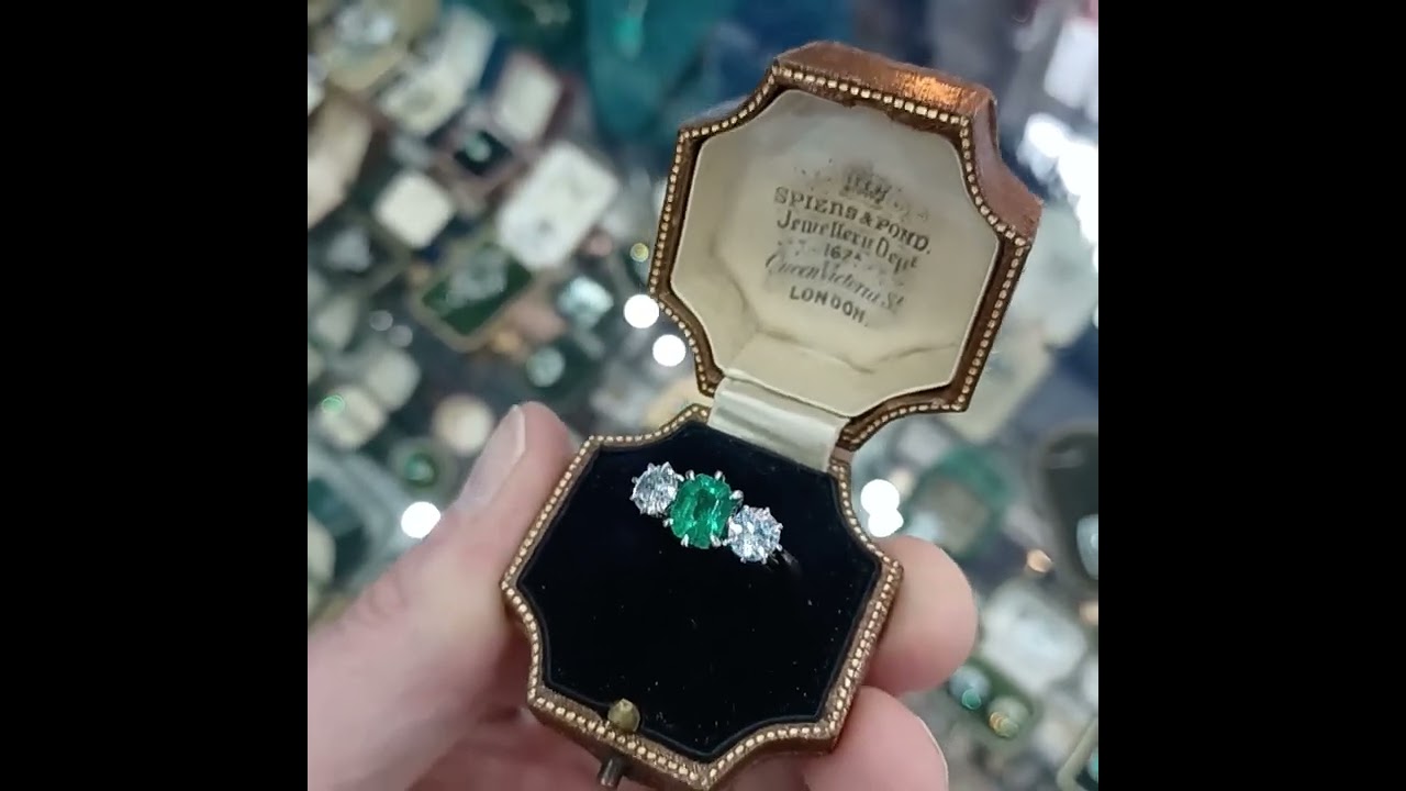 ER058   Beautiful three stone emerald and diamond ring, Art Deco