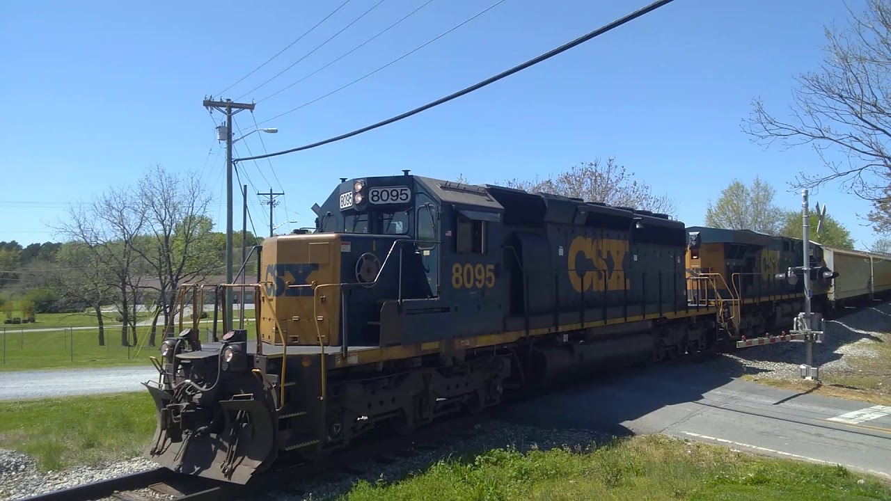 CSX local Train F792 pulling back into town with CSXT 8095 in the lead ...