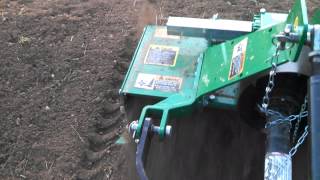 JD 1023e with tiller attachment