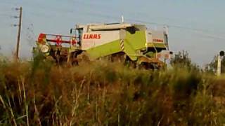 Claas Lexion 480 Riso carried by a tractor.-Agios Athanasios Salonika