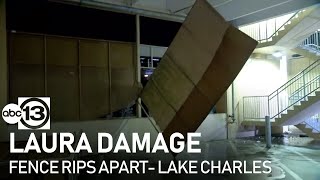 Hurricane Laura's winds tear apart fence in Lake Charles