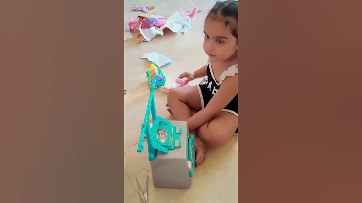 Lianna with her favourite washing machine