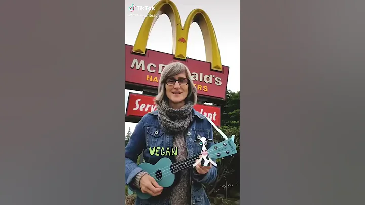 Miss Karen sings a vegan song in front of McDonald’s