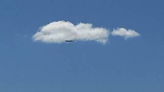 Airplane wings making clouds as it flies through super saturated atmosphere