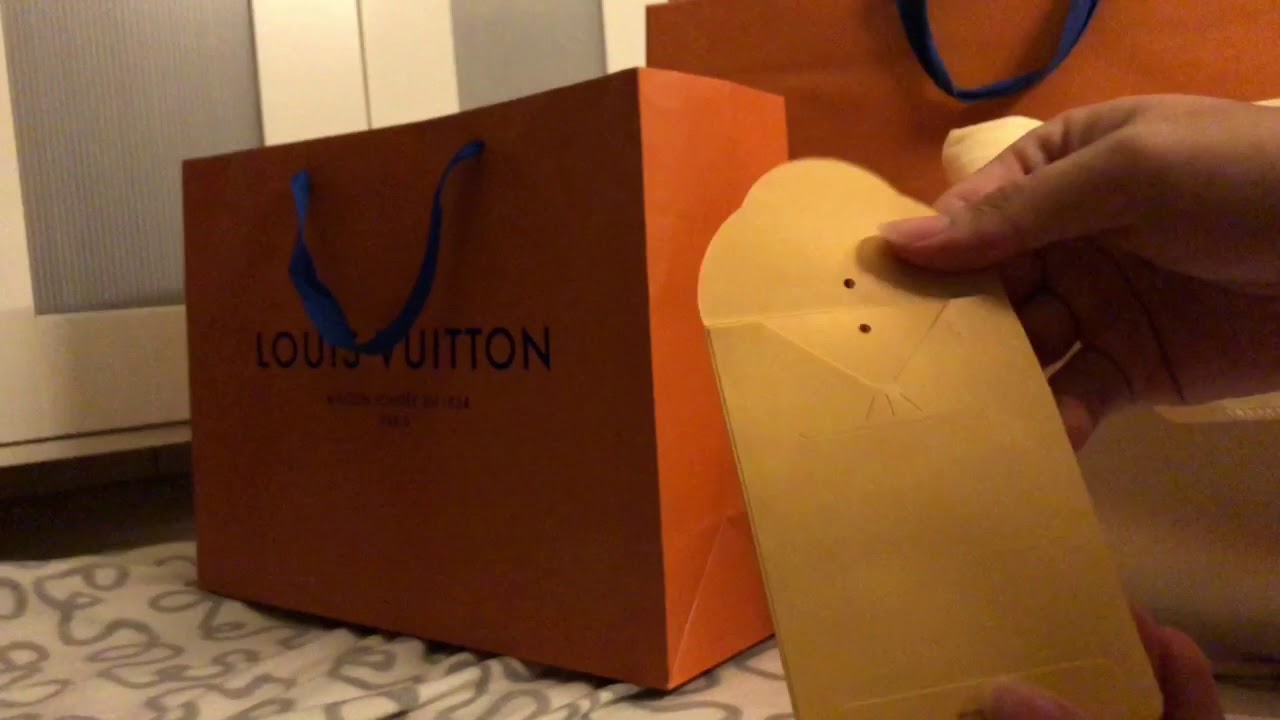 louis vuitton paper bag real vs fake