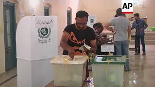 Voters in Lahore cast ballots in Pakistan election