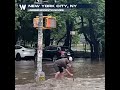 New Yorker Drains Flooded Road