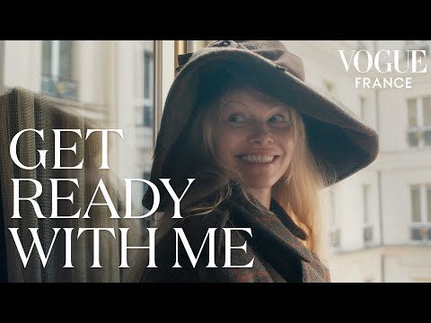A makeup-free Pamela Anderson gets ready for the Vivienne Westwood show l Vogue France