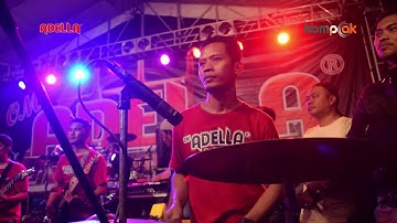 Om adella dinding kaca