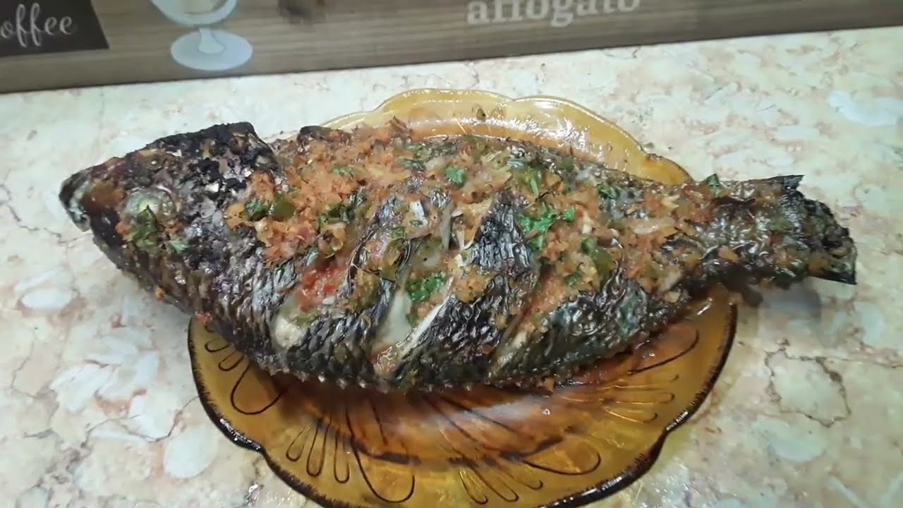 صنية سمك بلطى محشى بالخضار