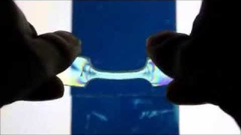 Photoelastic phenomenon in PC