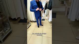 Mąż kupuje garnitur. Zakupy. Suit. Komunia