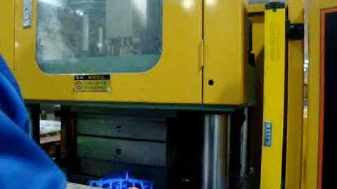 Toothbrush injection molding machine for two color