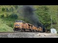 Southbound Union Pacific billows smoke as it exits Tunnel