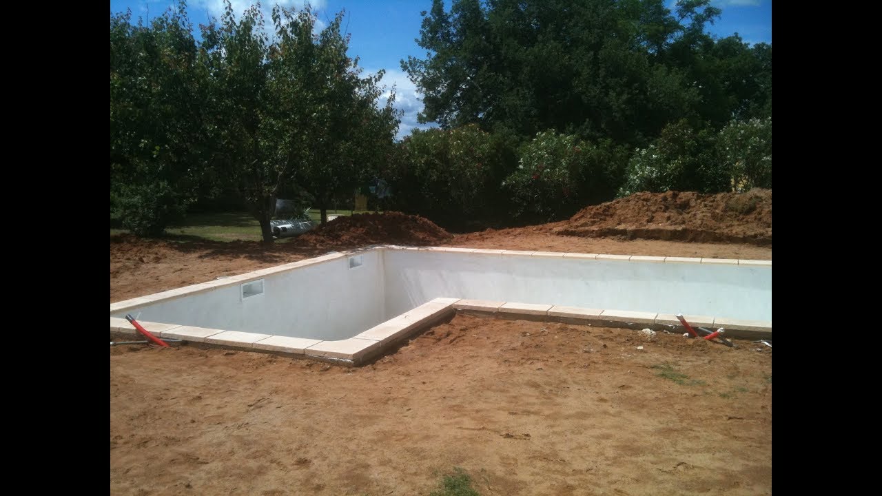 Piscine en béton armé agglos à bancher avec petit bassin de 27 4*8*1,40