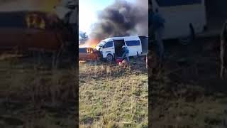 Taxi burns in a head on collision...