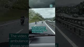 Motorcyclists performing stunts block ambulance on Malaysian highway