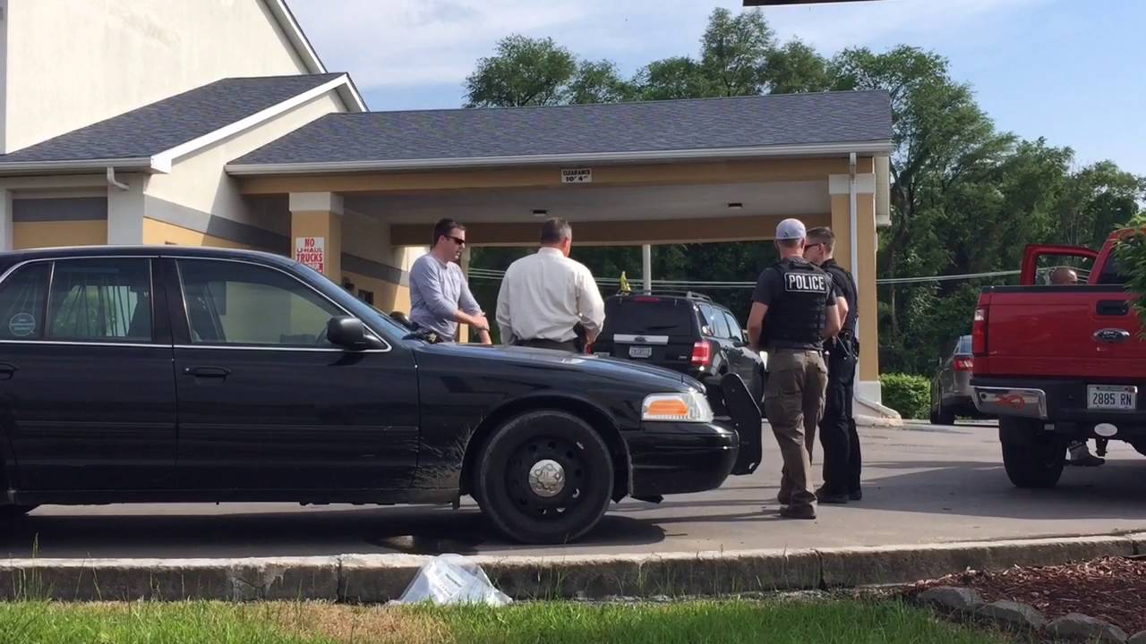 Caseyville and Illinois State Police outside the Rodeway Inn in